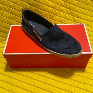 Navy blue coach slip ons